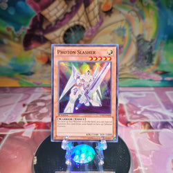 A Super Rare "Photon Slasher" card from the Yugioh Zexal Collection Tins.