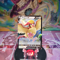 An Ultra Rare "Pidgeot V" (137/196) card from the Pokemon Set: Lost Origin.