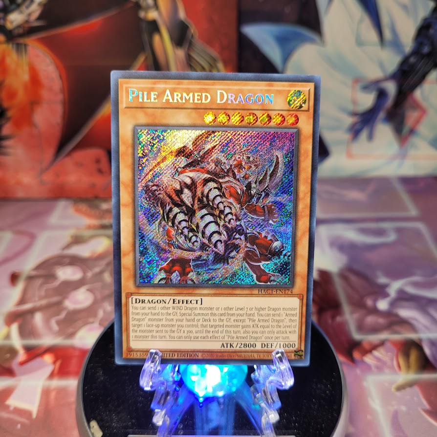 A Secret Rare "Pile Armed Dragon" card from the Yugioh Set: Hidden Arsenal: Chapter 1 (HAC1).
