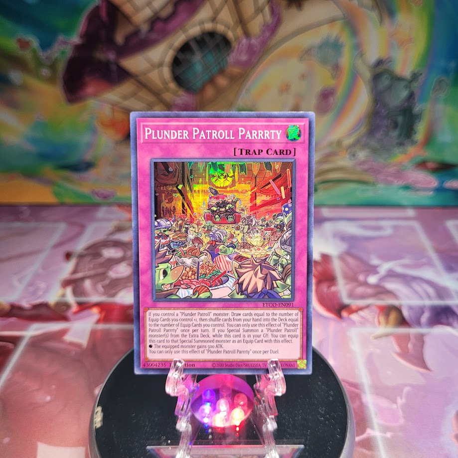 A Super Rare "Plunder Patroll Parrrty" card from the Yugioh Set: Eternity Code. 