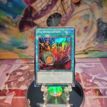 A Super Rare "Polymerization" card from the Yugioh Set: Quarter Century Bonanza (RA03).