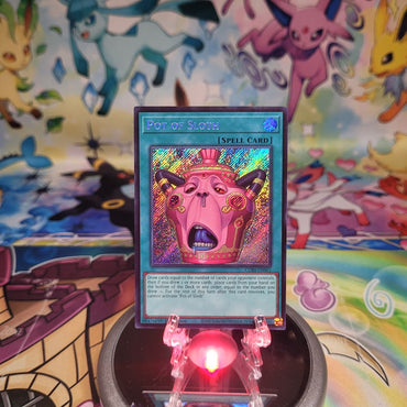 A Secret Rare “Pot of Sloth” card from the Yugioh Set: Chaos Origins (CORI).