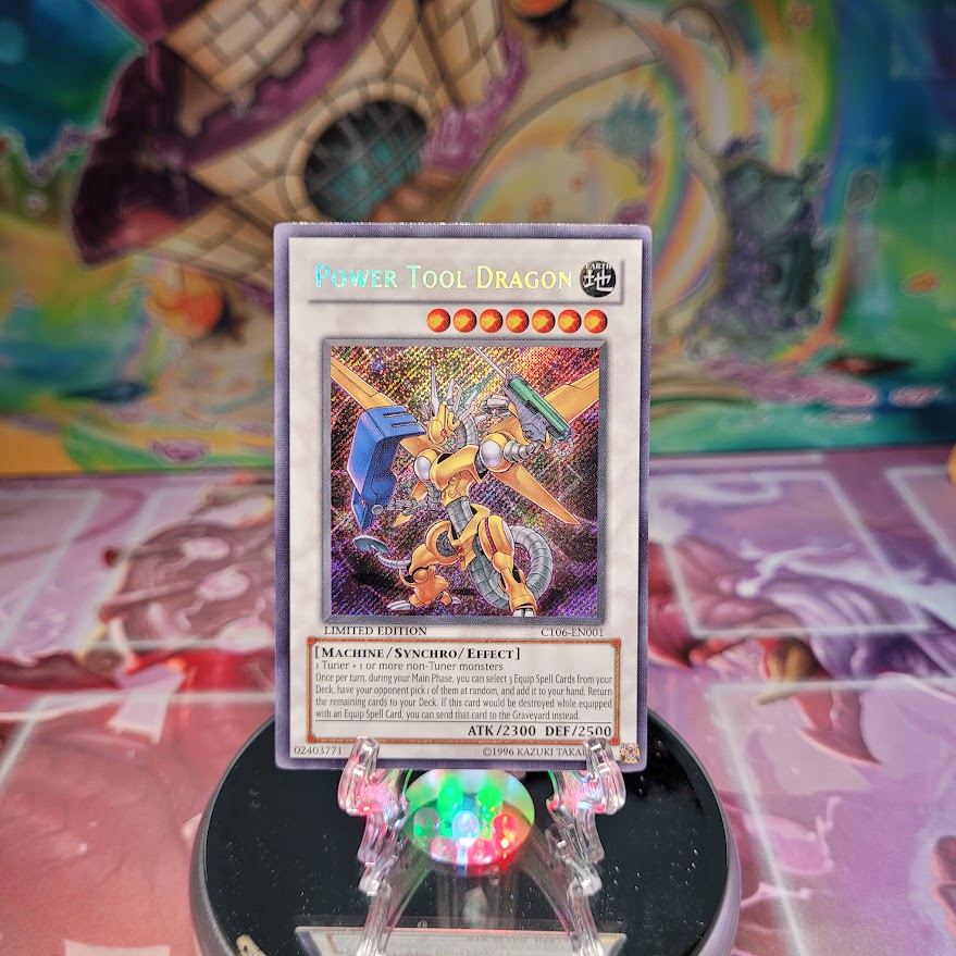 A Secret Rare "Power Tool Dragon" card from the Yugioh 2009 Collector Tins (CT06).