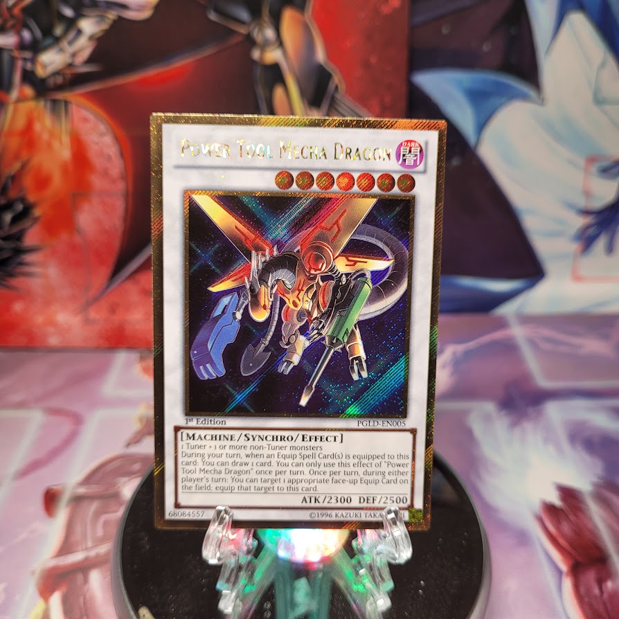 A Gold Secret Rare "Power Tool Mecha Dragon" card from the Yugioh Set: Premium Gold.