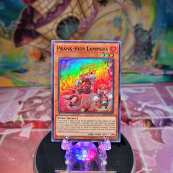 A Super Rare "Prank-Kids Lampsies" card from the Yugioh Set: Hidden Summoners.