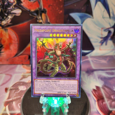 An Ultra Rare "Predaplant Dragostapelia" card from the Yugioh Set: Rarity Collection 1 (RA01).