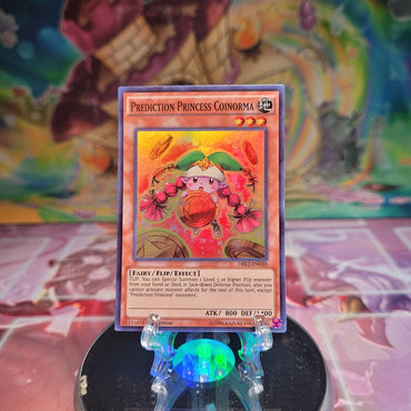 A Super Rare "Prediction Princess Coinorma" card from the Yugioh Set: Dragons of Legend 2.