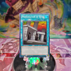 A Super Rare "Preparation of Rites" card from the Yugioh Set: Rarity Collection 2 (RA02).