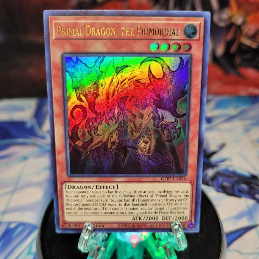  An Ultra Rare "Primal Dragon, the Primordial" card from the Yugioh Set: Ghosts From the Past: The 2nd Haunting (GFP2).