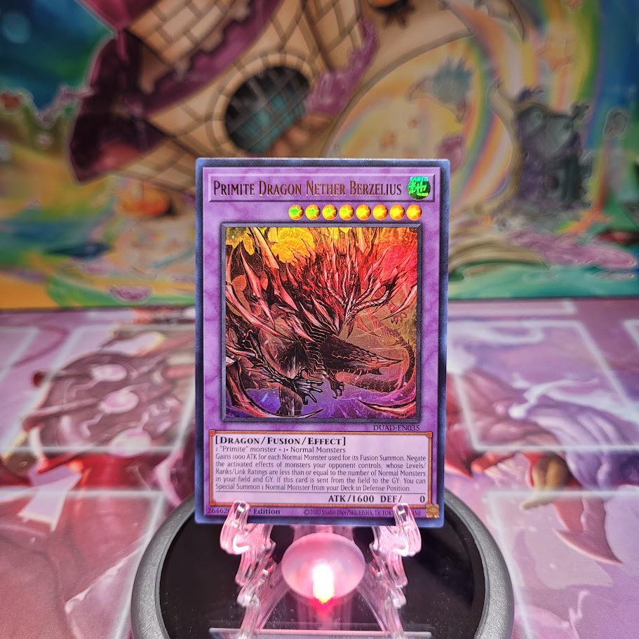 An Ultra Rare "Primite Dragon Nether Berzelius" card from the Yugioh Set: Duelist's Advance (DUAD).