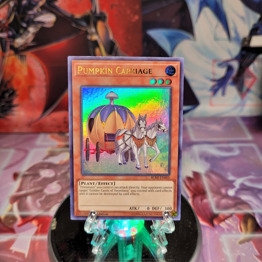 An Ultra Rare "Pumpkin Carriage" card from the Yugioh Set: Battles of Legend: Relentless Revenge.