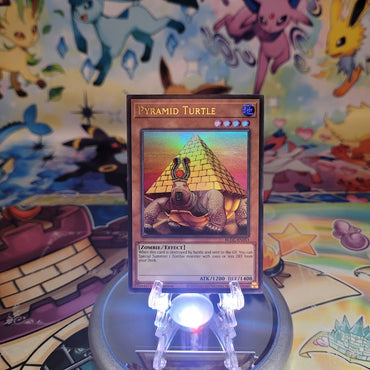 An Ultra Rare "Pyramid Turtle" card from the Yugioh Set: Battles of Legend: Glorious Gallery (BLGG).