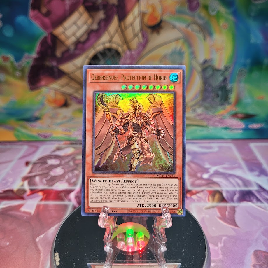 An Ultra Rare "Qebehsenuef, Protection of Horus" card from the Yugioh Set: 25th Anniversary Tin: Dueling Mirrors.