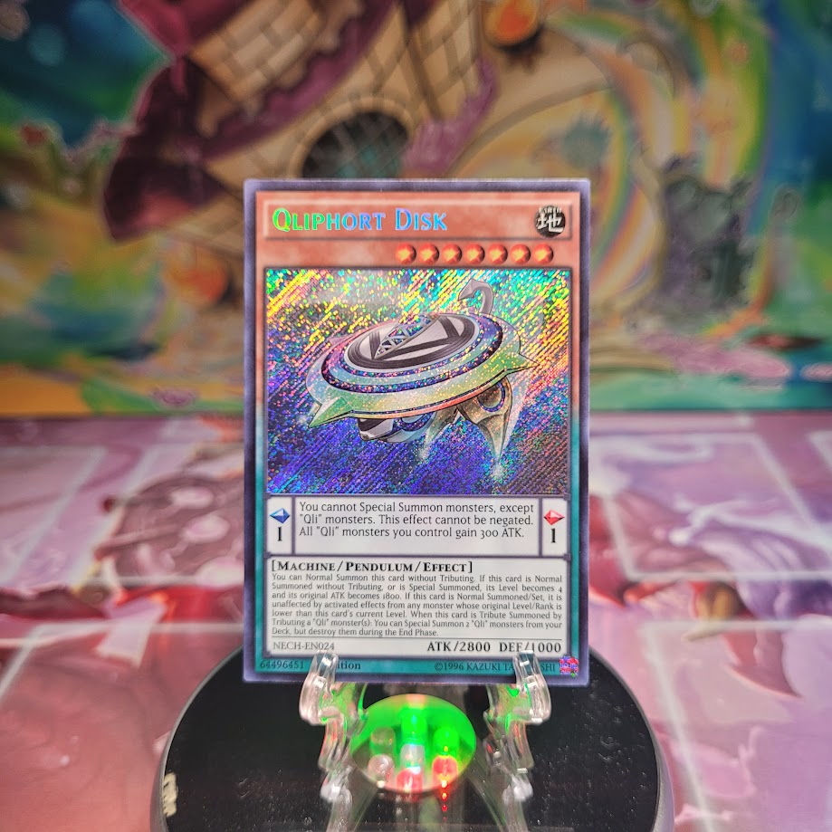 A Secret Rare "Qliphort Disk" card from the Yugioh Set: The New Challengers.