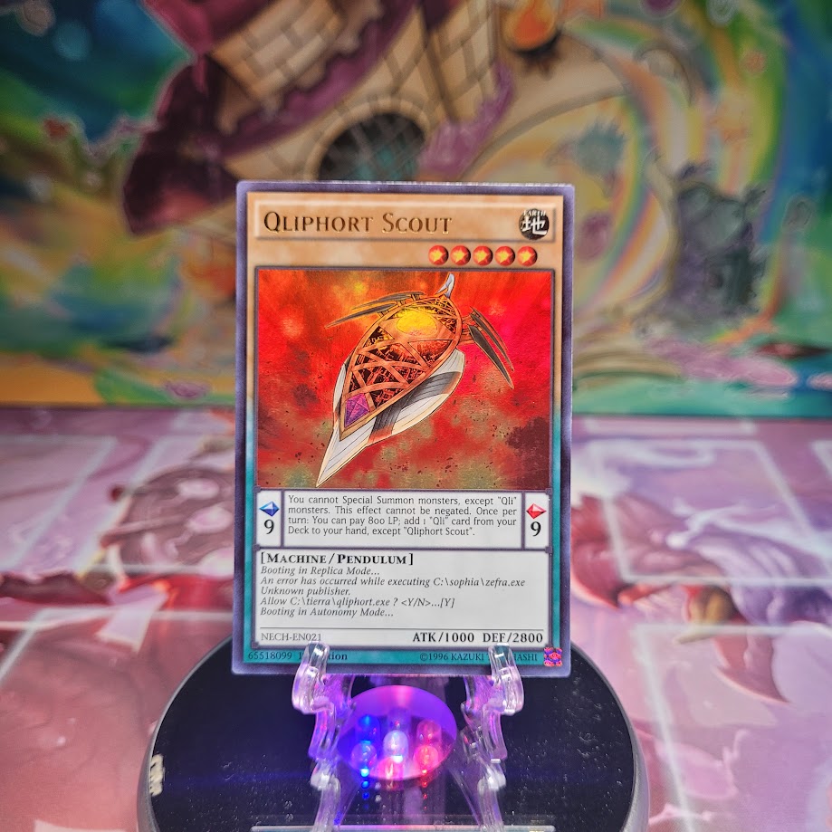 An Ultra Rare "Qliphort Scout" card from the Yugioh Set: The New Challengers.