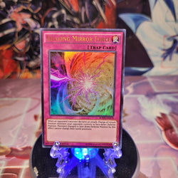 An Ultra Rare "Quaking Mirror Force" card from the Yugioh Set: Breakers of Shadow (BOSH).