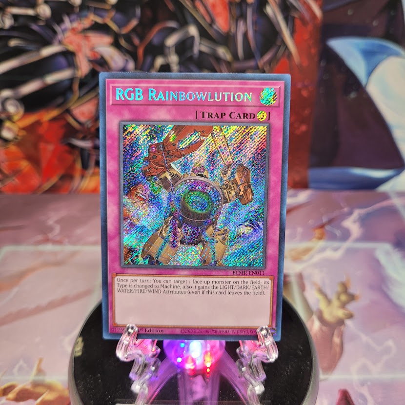 A Secret Rare "RGB Rainbowlution" card from the Yugioh Set: Battles of Legend: Monstrous Revenge.