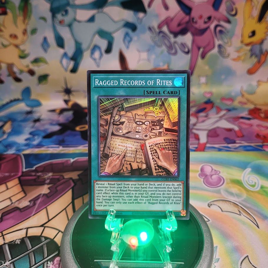 A Super Rare “Ragged Records of Rites” card from the Yugioh Set: Chaos Origins (CORI).
