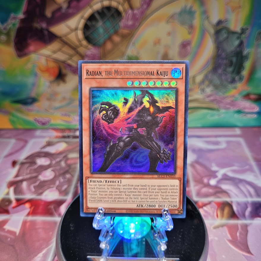 An Ultra Rare Silver "Raidan, the Multidimensional Kaiju" card from the Yugioh Set: Battles of Legend: Chapter 1.