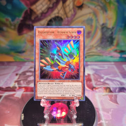 An Ultra Rare "Raidraptor - Rudder Strix" card from the Yugioh Set: Battles of Legend: Light's Revenge.