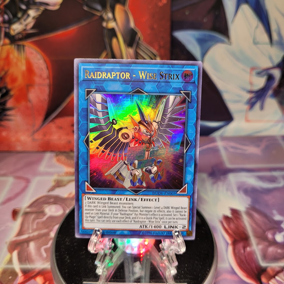 An Ultra Rare "Raidraptor - Wise Strix" card from the Yugioh Set: Duel Overload.