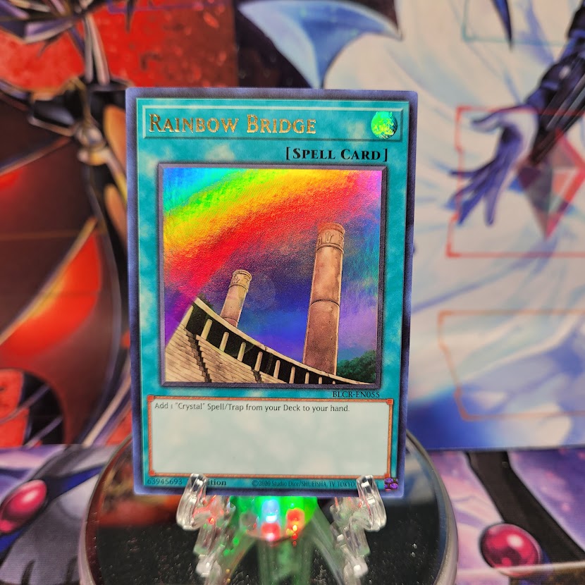 An Ultra Rare "Rainbow Bridge" card from the Yugioh Set: Battles of Legend: Crystal Revenge.