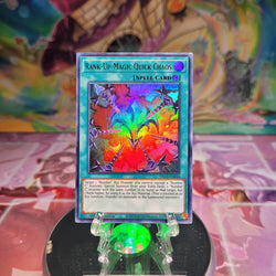 An Ultra Rare Green "Rank-Up-Magic Quick Chaos" card from the Yugioh Set: Dragons of Legend: The Complete Series.