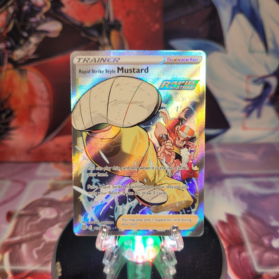 A Secret Rare Trainer Gallery "Rapid Strike Style Mustard" (TG27/TG30) card from the Pokemon Set: Sword & Shield: Brilliant Stars.