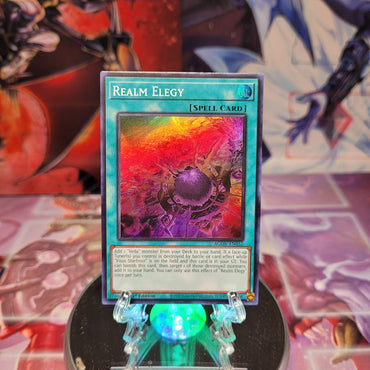 A Super Rare "Realm Elegy" card from the Yugioh Set: Age of Overlord.