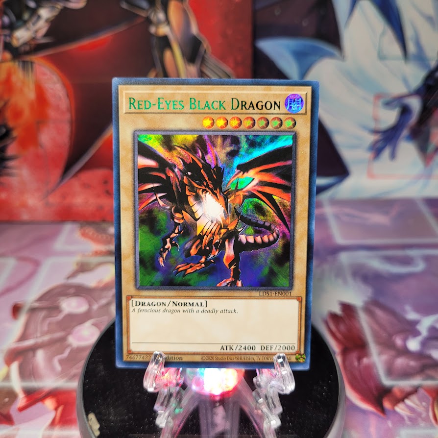 An Ultra Rare Green "Red-Eyes Black Dragon" card from the Yugioh Set: Legendary Duelists: Season 1 (LDS1).