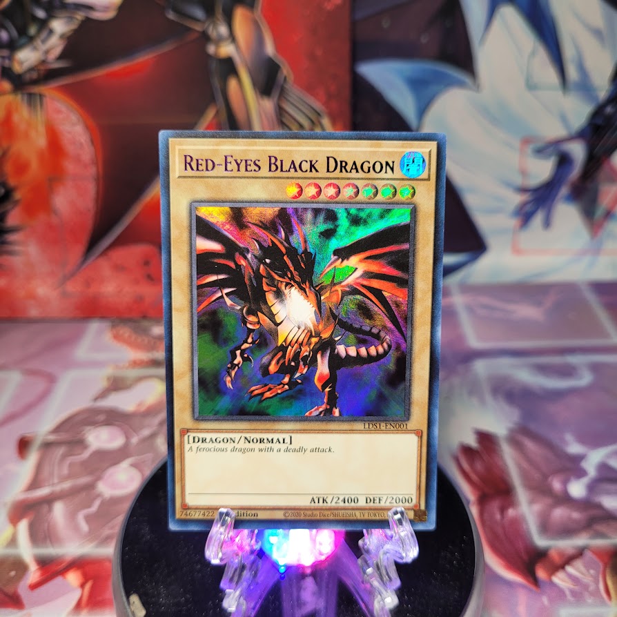 An Ultra Rare Purple "Red-Eyes Black Dragon" card from the Yugioh Set: Legendary Duelists: Season 1 (LDS1).