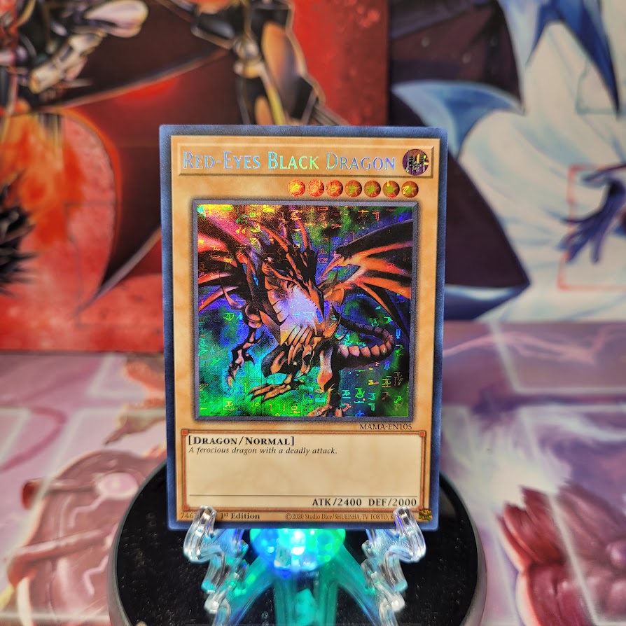 A Secret Pharaoh's Rare "Red-Eyes Black Dragon" card from the Yugioh Set: Magnificent Mavens. 