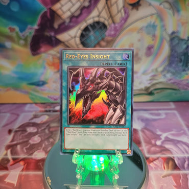 An Ultra Rare "Red-Eyes Insight" card from the Yugioh Set: Quarter Century Bonanza (RA03).