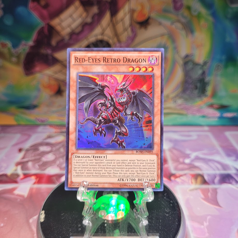 A Super Rare "Red-Eyes Retro Dragon" card from the Yugioh Set: Breakers of Shadow.