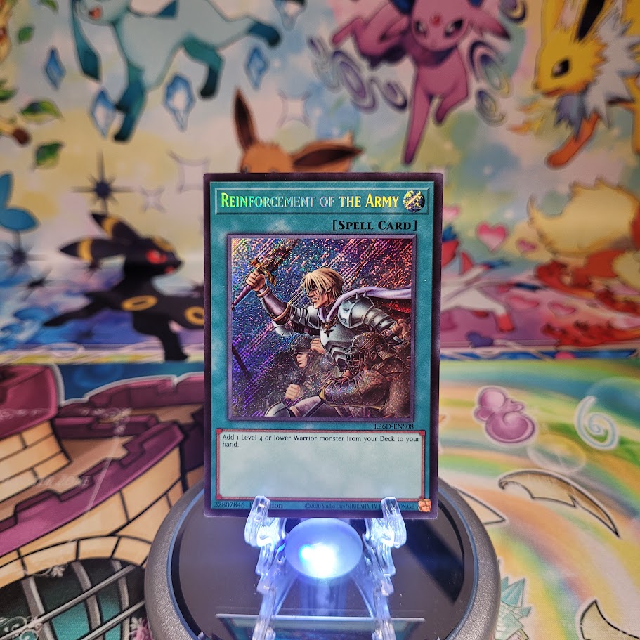 A Secret Rare "Reinforcement of the Army" card from the Yugioh Legendary Modern Decks (L26D).