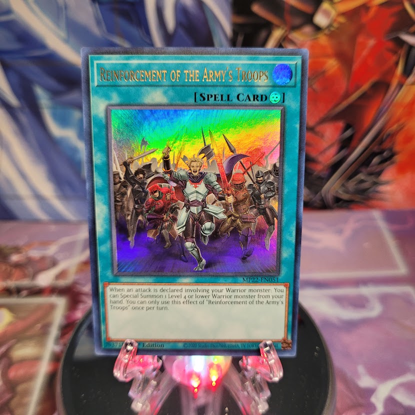 An Ultra Rare "Reinforcement of the Army's Troops" card from the Yugioh 2022 Tin of the Pharaoh's Gods Set.