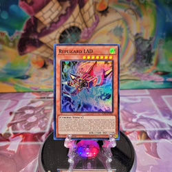 A Super Rare "Replicard LAD" card from the Yugioh Set: Alliance Insight (ALIN).