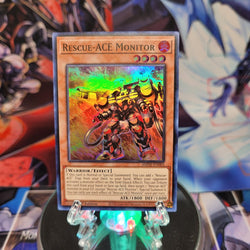 A Super Rare "Rescue-Ace Monitor" card from the Yugioh Set: Amazing Defenders.