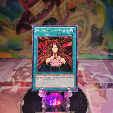 A Super Rare "Resurrection of Chakra" card from the Yugioh Set: Number Hunters.