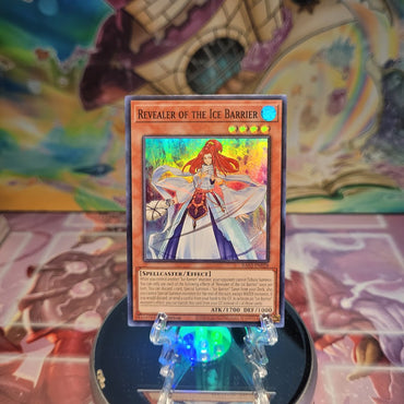 A Super Rare "Revealer of the Ice Barrier" card from the Yugioh Set: Quarter Century Bonanza (RA03).