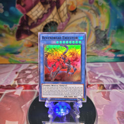 A Super Rare "Revendread Executor" card from the Yugioh 2019 Mega-Tin Mega Pack.