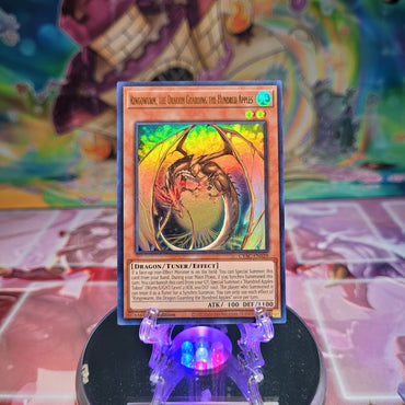 An Ultra Rare "Ringowurm, the Dragon Guarding the Hundred Apples" card from the Yugioh Set: Cyberstorm Access.