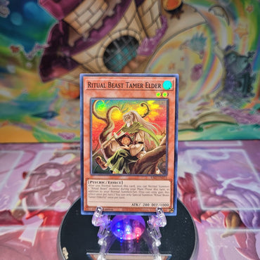 A Super Rare "Ritual Beast Tamer Elder" card from the Yugioh Set: Quarter Century Bonanza (RA03).