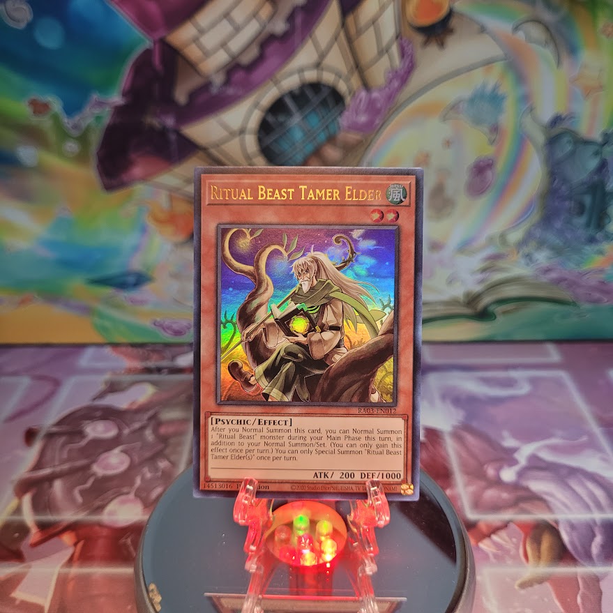 An Ultra Rare "Ritual Beast Tamer Elder" card from the Yugioh Set: Quarter Century Bonanza (RA03).