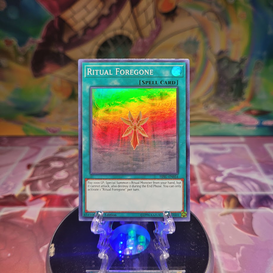 A Super Rare "Ritual Foregone" card from the Yugioh Set: Hidden Summoners.