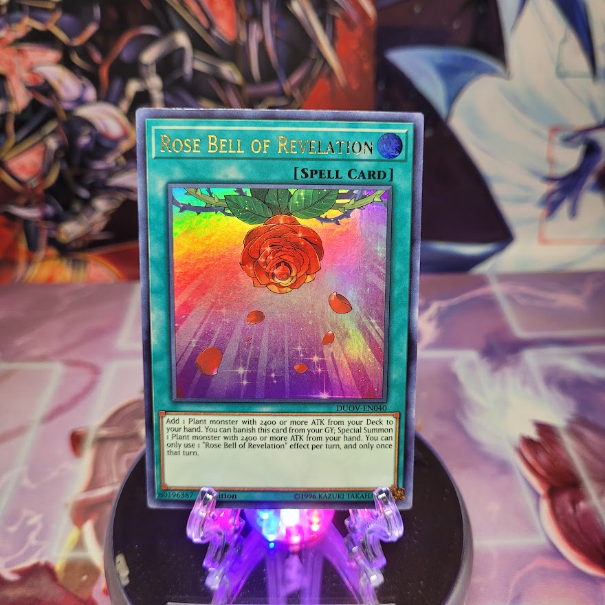  An Ultra Rare "Rose Bell of Revelation" card from the Yugioh Set: Duel Overload.