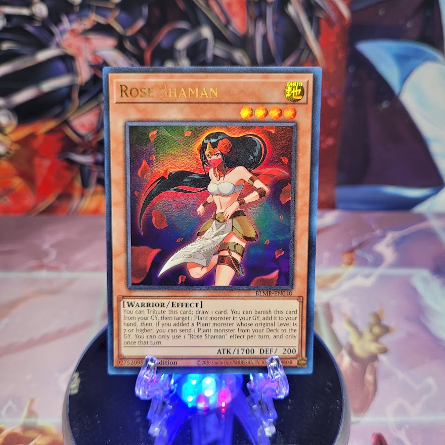 An Ultra Rare "Rose Shaman" card from the Yugioh Set: Battles of Legend: Monstrous Revenge.