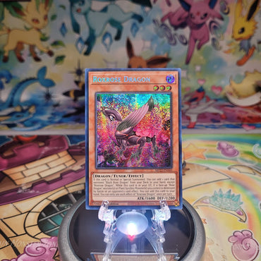 A Prismatic Secret Rare "Roxrose Dragon" card from the Yugioh 2022 Tin of the Pharaoh's Gods set (MP22).