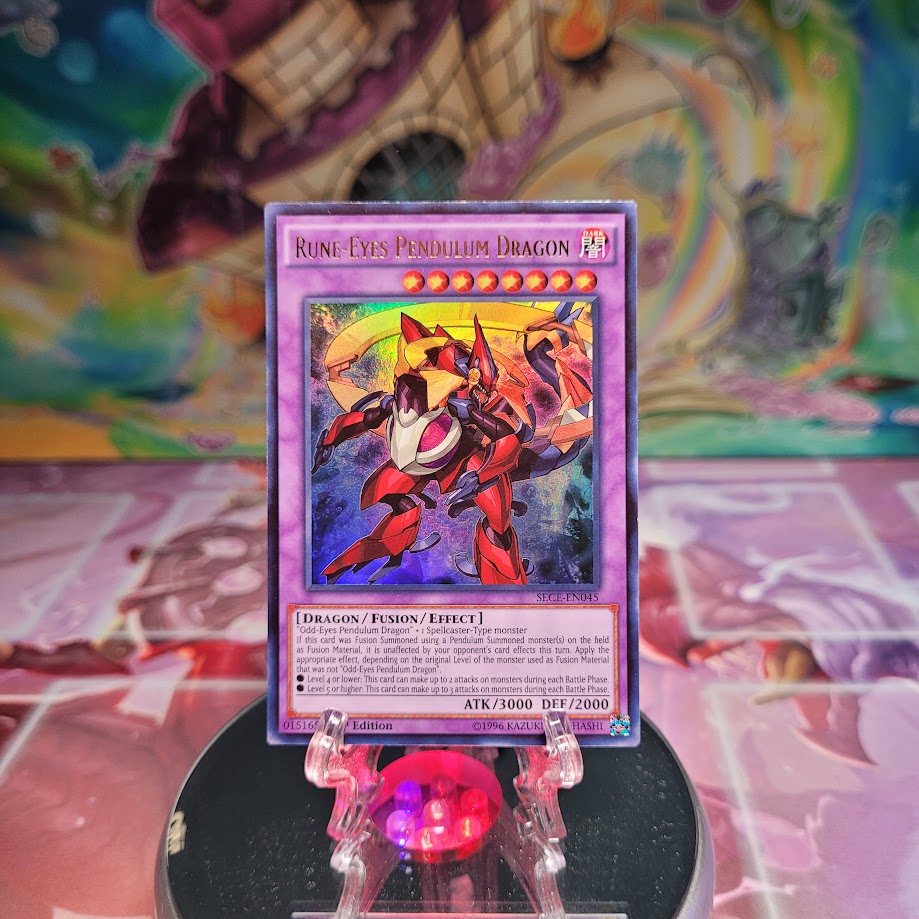 An Ultra Rare "Rune-Eyes Pendulum Dragon" card from the Yugioh Set: Secrets of Eternity. 