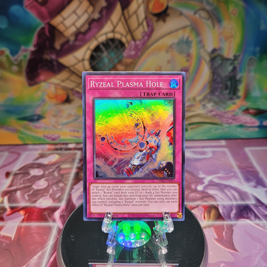 A Super Rare "Ryzeal Plasma Hole" card from the Yugioh Set: Crossover Breakers.
